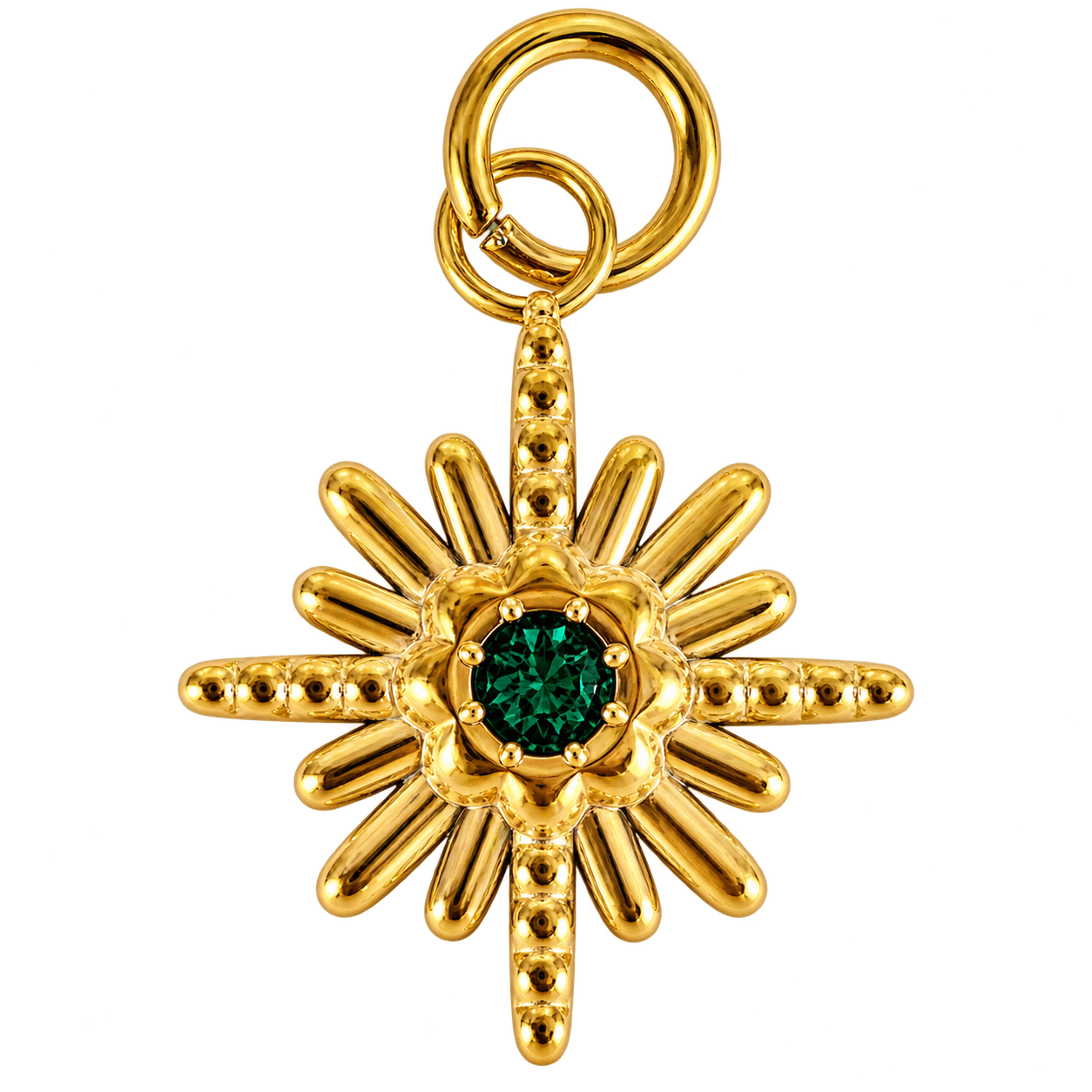 Gold-tone starburst charm with emerald-green center stone