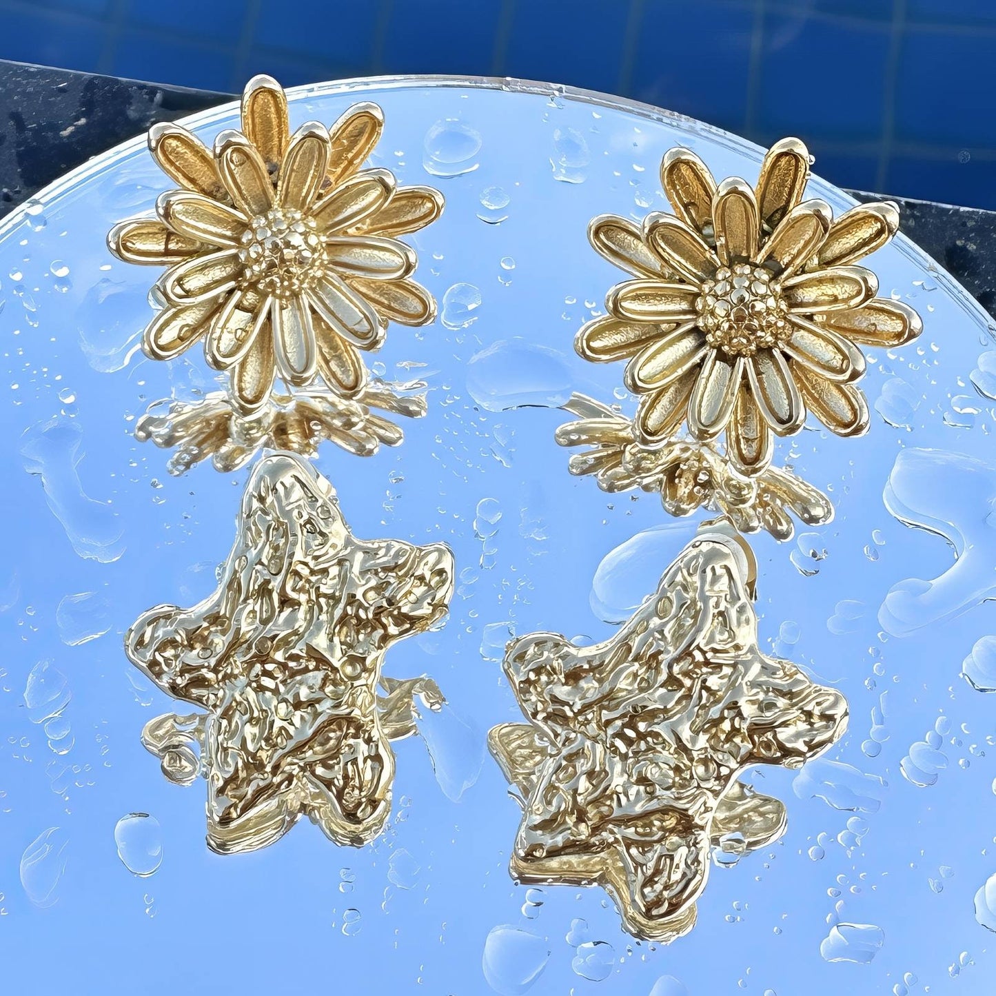 Pendientes Flores de acero inoxidable bañados en oro de 18K,