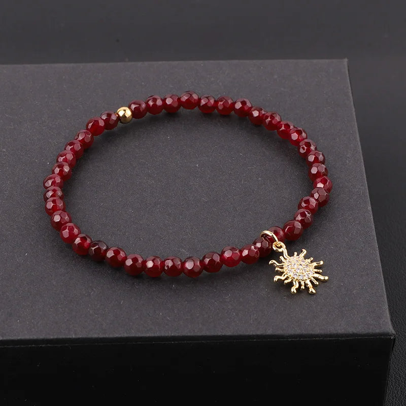 The Solstice Red Jade & Gold Sun Charm Beaded Bracelet