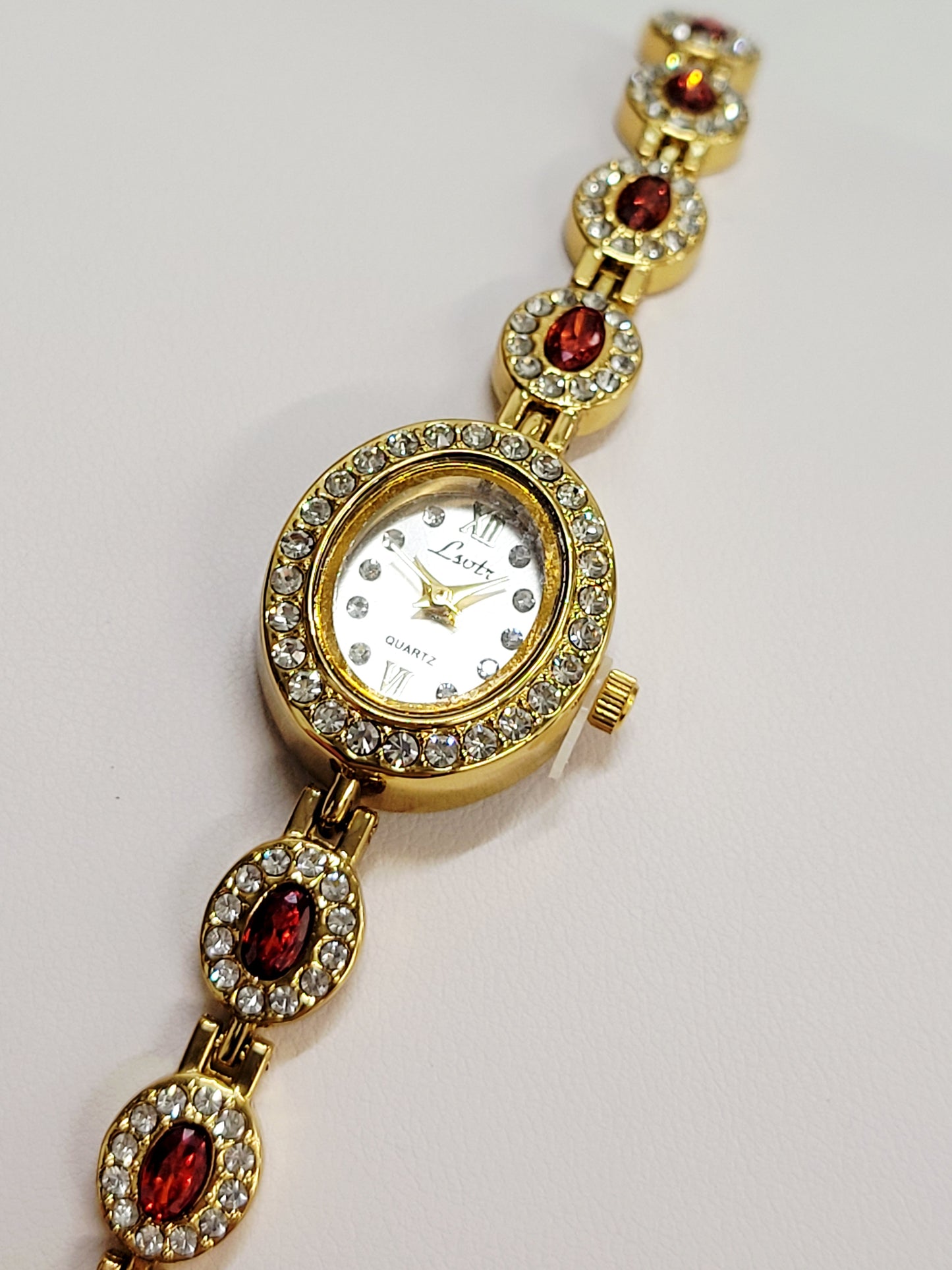 Golden Garnet Halo Bracelet-Style Watch