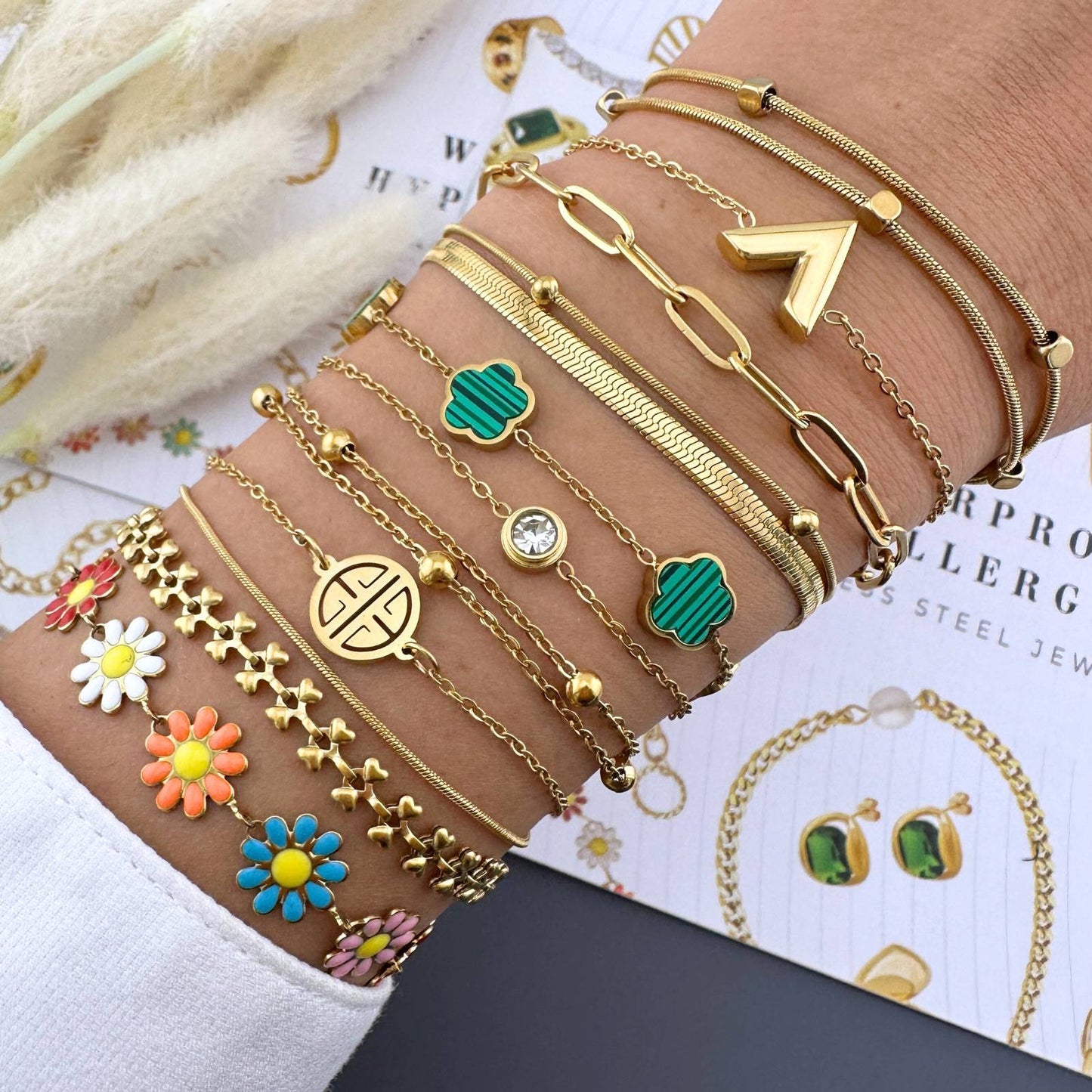 Pulsera Flores en acero inoxidable bañada en oro de 18K,