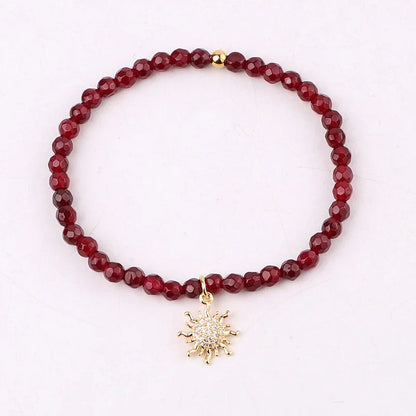 The Solstice Red Jade & Gold Sun Charm Beaded Bracelet