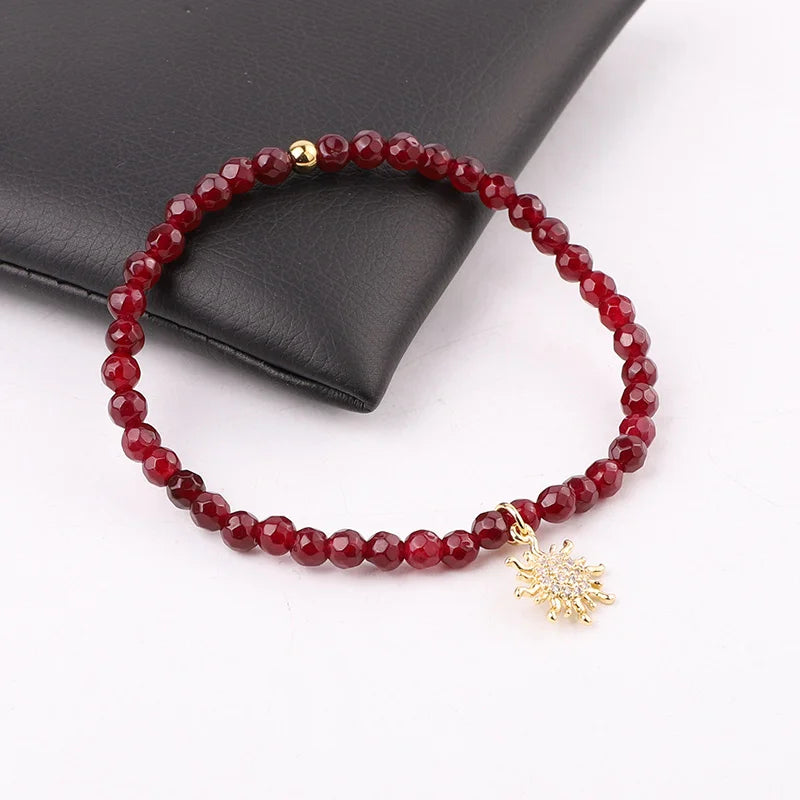 The Solstice Red Jade & Gold Sun Charm Beaded Bracelet