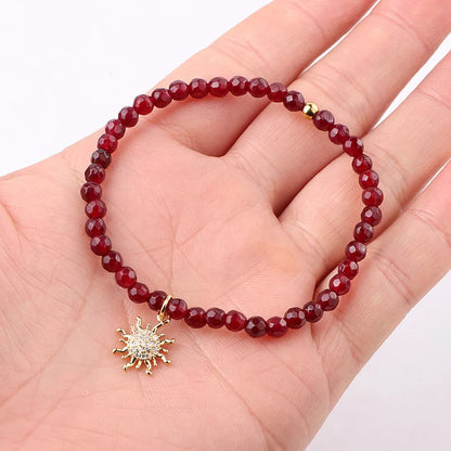 The Solstice Red Jade & Gold Sun Charm Beaded Bracelet