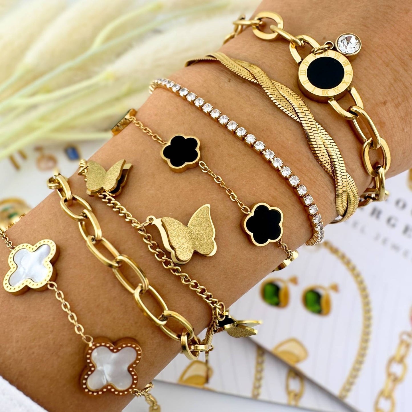 Pulsera Mariposas en acero inoxidable bañada en oro de 18K,