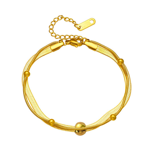 Pulsera de acero inoxidable bañada en oro de 18 quilates.