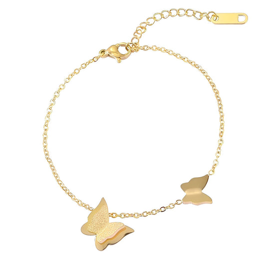 Pulsera Mariposas en acero inoxidable bañada en oro de 18K,