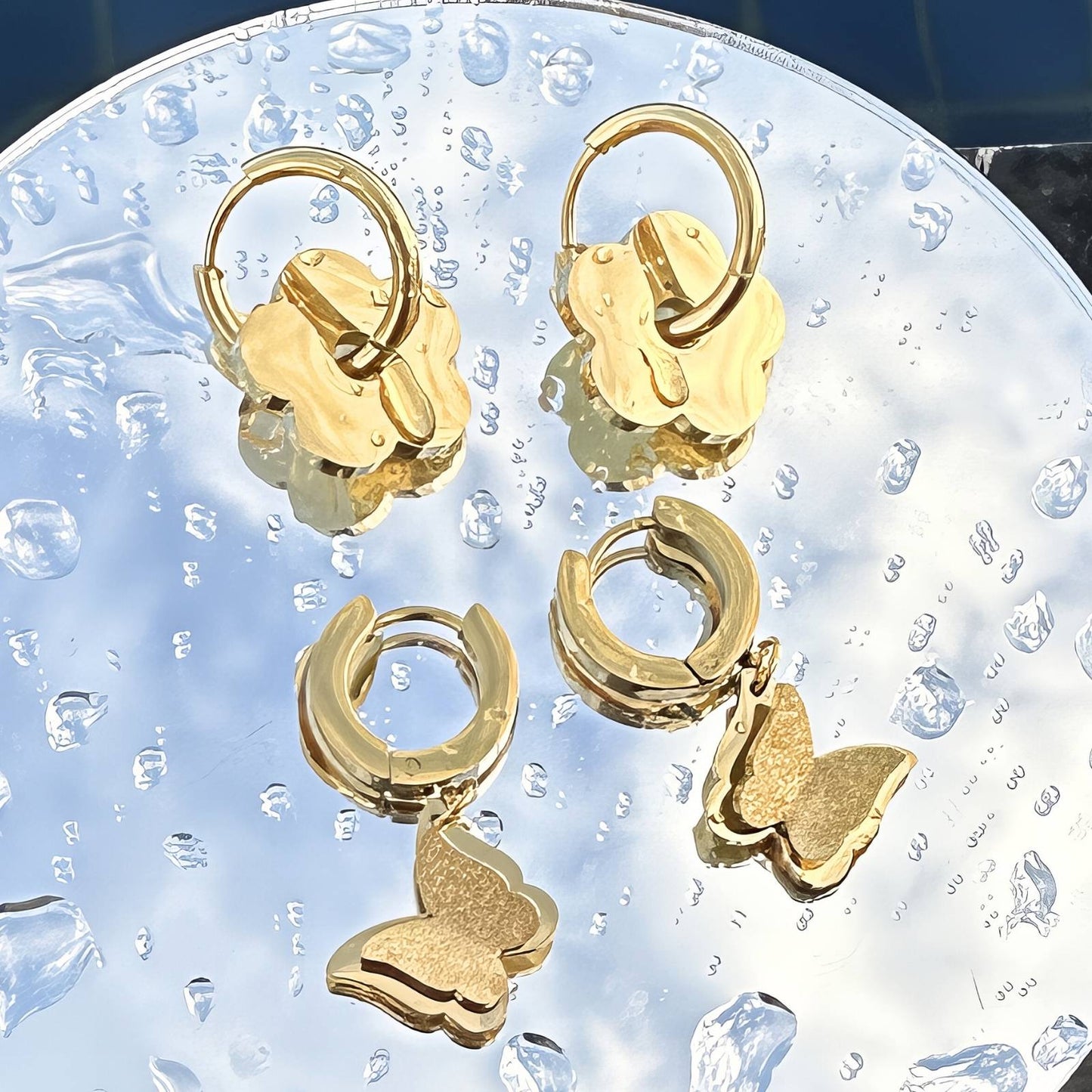 Pendientes Flores de acero inoxidable bañados en oro de 18K,