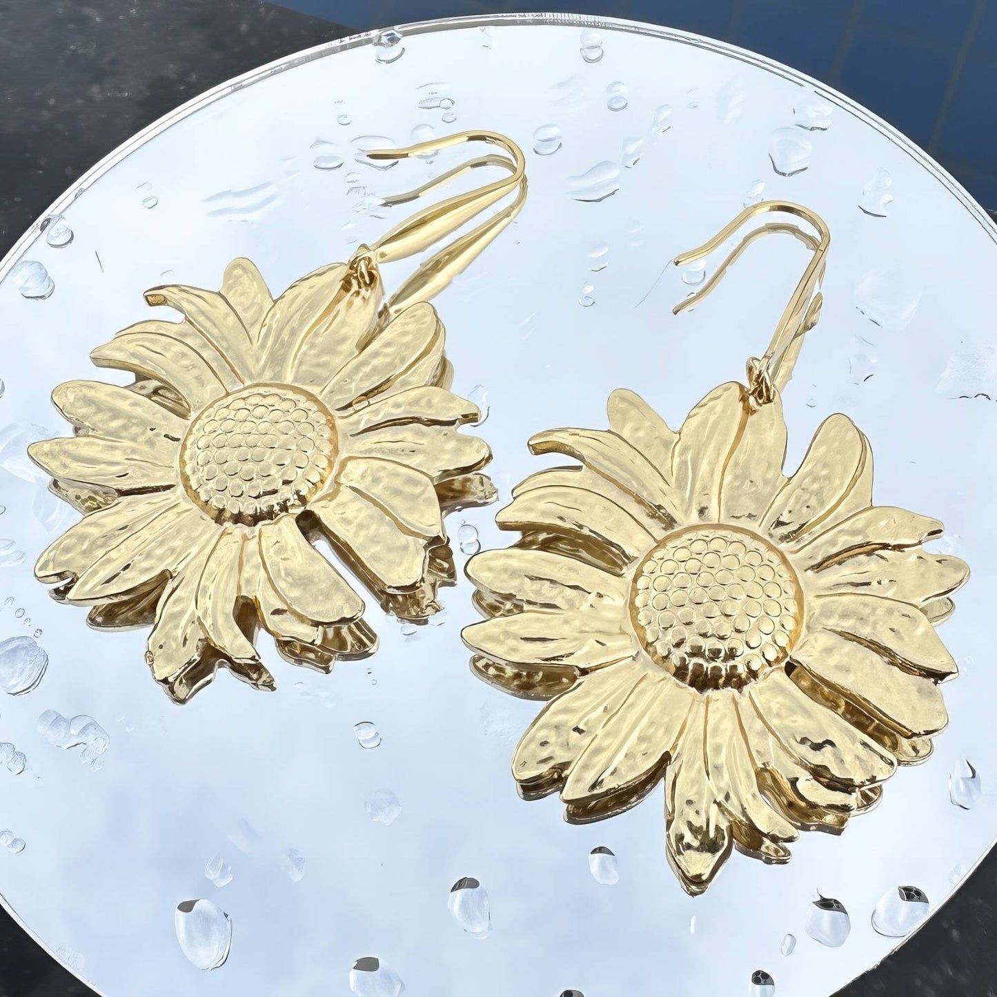 Pendientes Flores de acero inoxidable bañados en oro de 18K,