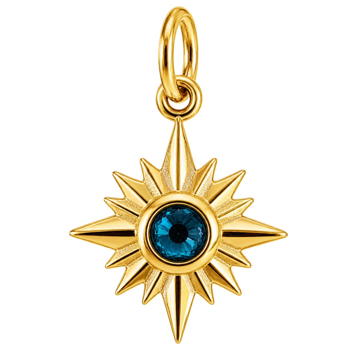 Gold-tone compass starburst charm with deep blue crystal center