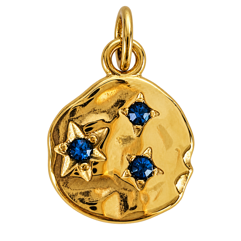 Organic gold-tone disc charm with three deep-blue crystal stars