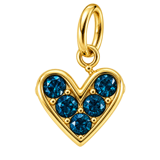 Gold-tone heart charm set with five deep blue crystals