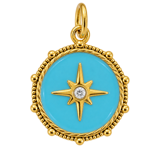 Turquoise enamel starburst charm with gold-tone border and clear center crystal