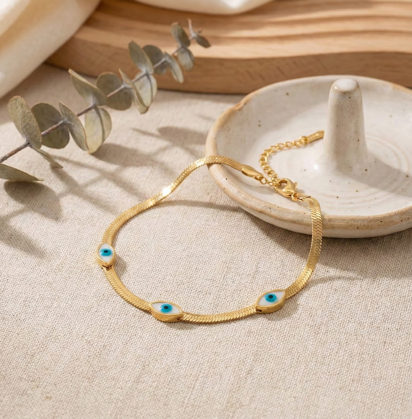 The Luna Evil Eye Herringbone Bracelet in 18K Gold