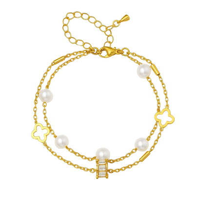 Gold anklet with white pearls and clover charms on white background – Pretty Pickie product photo