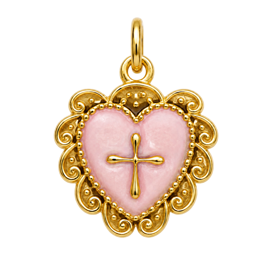 Pink pearlescent heart charm with gold-tone cross and ornate border