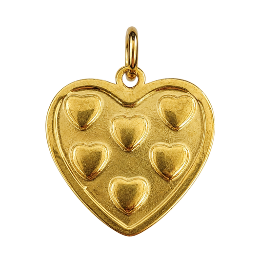 Polished gold-tone heart medallion charm with six raised hearts