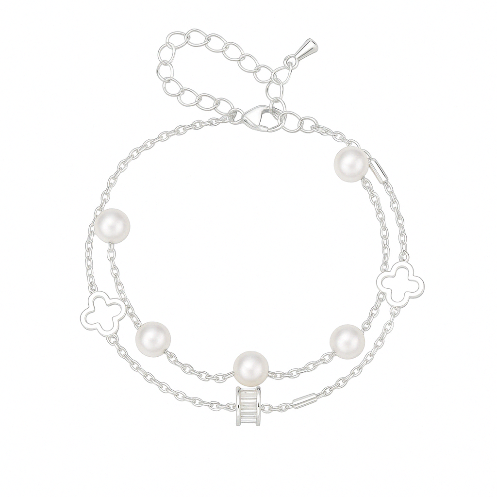 Silver anklet with white pearls and clover charms on white background – Pretty Pickie product photo
