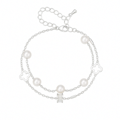 Silver anklet with white pearls and clover charms on white background – Pretty Pickie product photo
